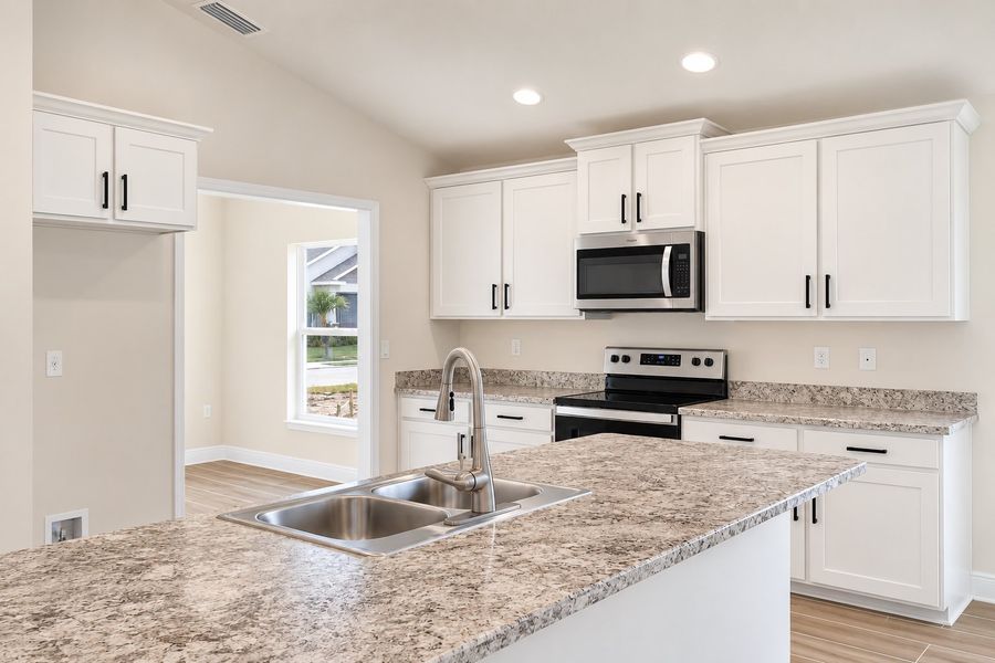 Furnished interior view inside a new home in St. John's Preserve, Palm Bay (Image 10).