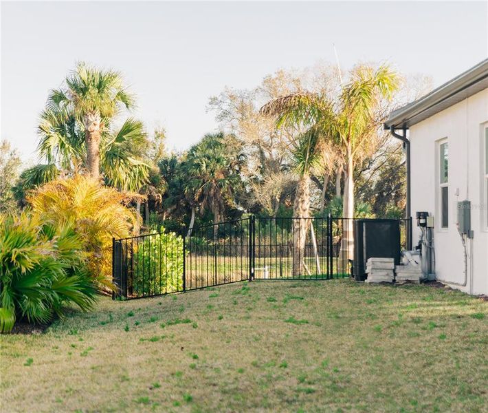 Exterior details and patio area of a home in , Nokomis (Image 28).