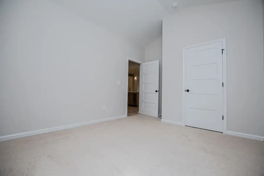 Spacious, unfurnished interior of a new home in WOODMONT RESERVE, Roopville (Image 65).