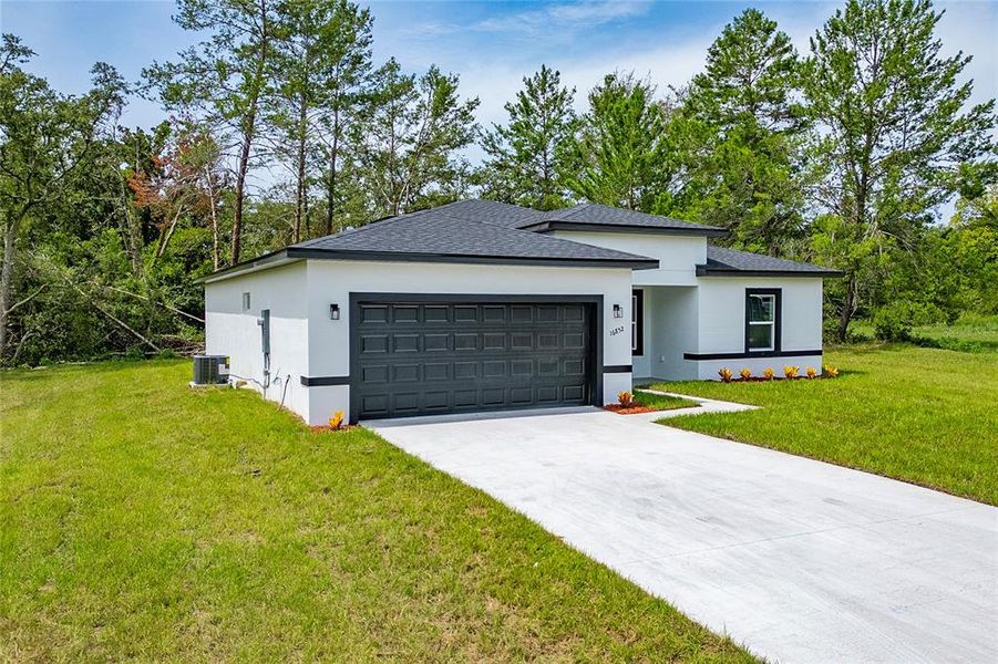 Front exterior of a new home in , Ocala, FL, highlighting curb appeal (Image 19).