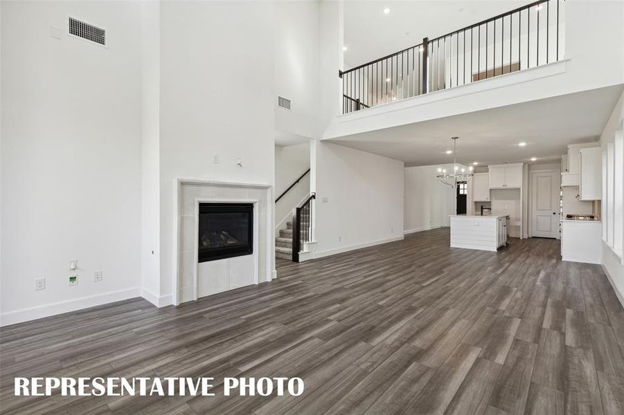 The game room is open to the main floor living area creating a multi-level entertainment zone! REPRESENTATIVE PHOTO The game room is open to the main floor living area creating a multi-level entertainment zone! REPRESENTATIVE PHOTO