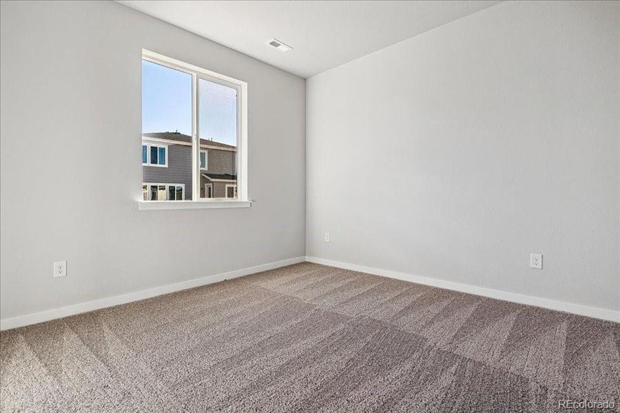 Spacious, unfurnished interior of a new home in Floret Collection at Alder Creek, Parker (Image 14).