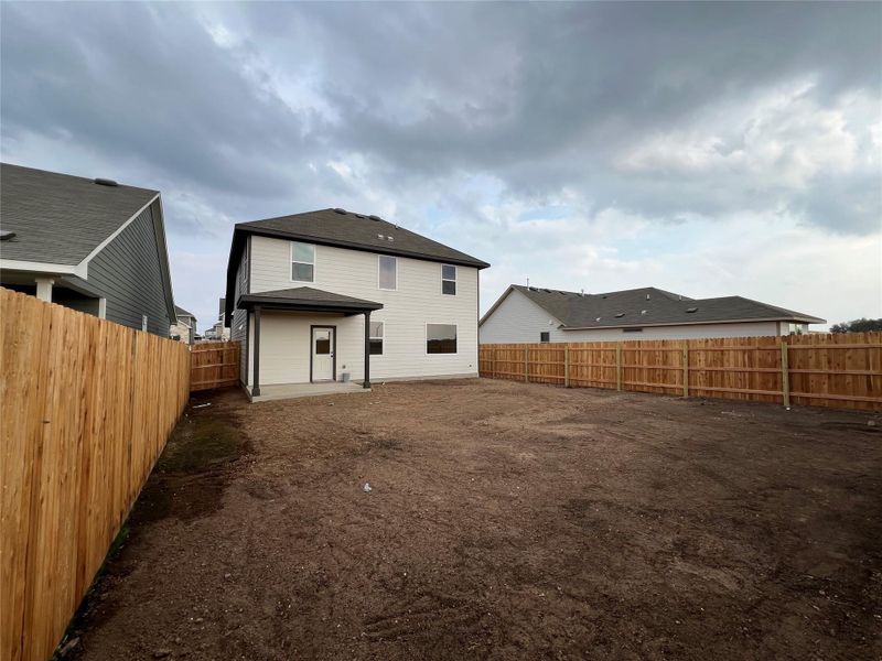 Exterior details and patio area of a home in Rolling Glen, Hutto (Image 4).