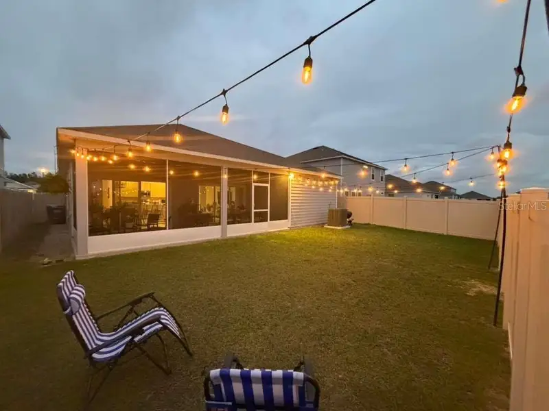 Exterior details and patio area of a home in , Newberry (Image 18).