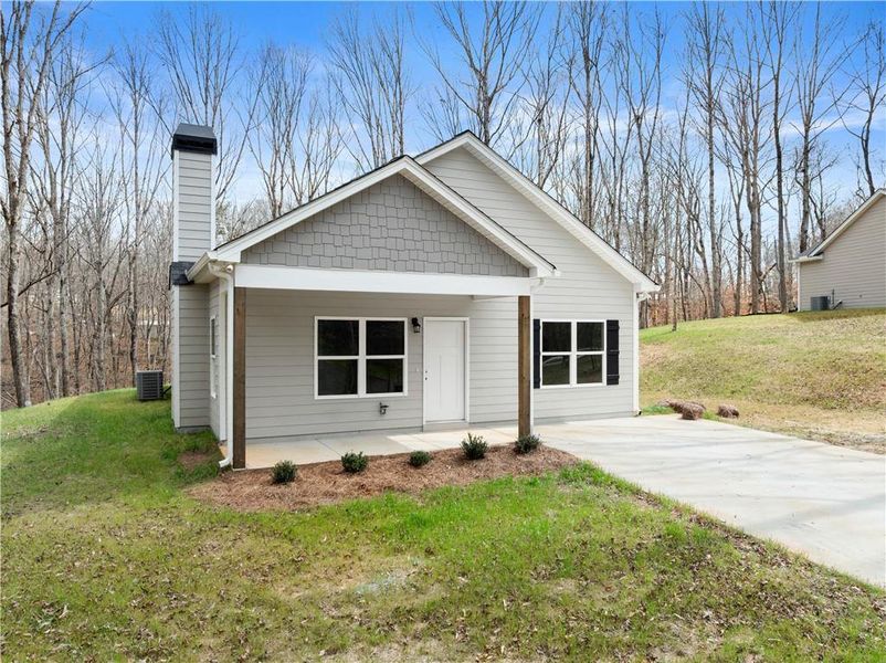 Front exterior of a new home in , Cleveland, GA, highlighting curb appeal (Image 2). Front exterior of a new home in , Cleveland, GA, highlighting curb appeal (Image 2).