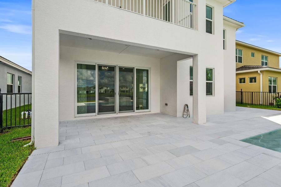 Exterior details and patio area of a home in , The Acreage (Image 1). Exterior details and patio area of a home in , The Acreage (Image 1).