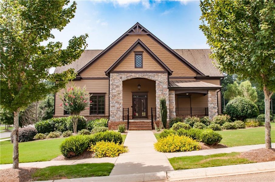 Front exterior of a new home in The Reserve At Liberty Park, Braselton, GA, highlighting curb appeal (Image 24). Front exterior of a new home in The Reserve At Liberty Park, Braselton, GA, highlighting curb appeal (Image 24).