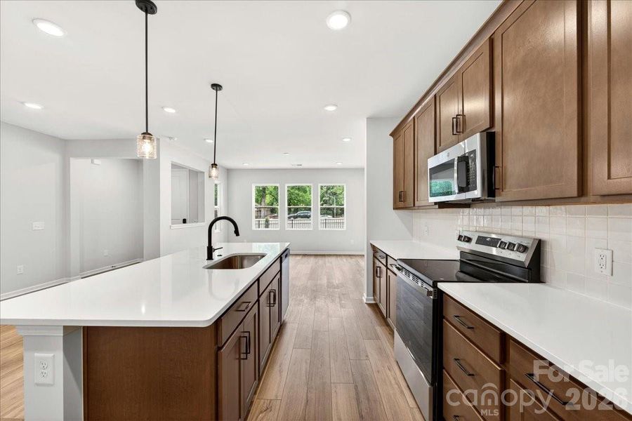 Kitchen with electric range Kitchen with electric range