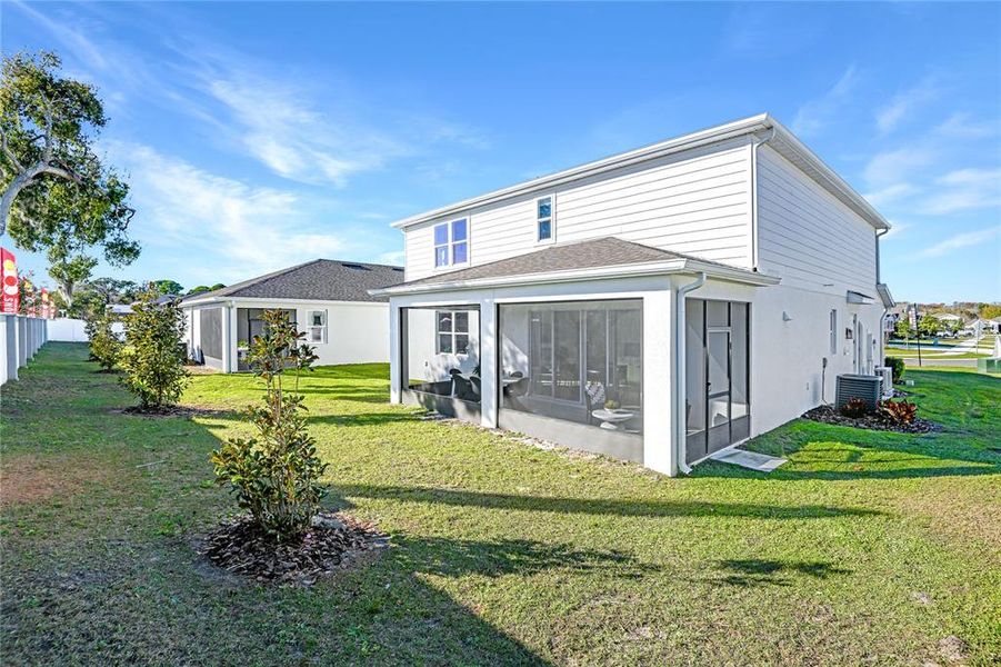 Exterior details and patio area of a home in Seaport Village, Tavares (Image 19).