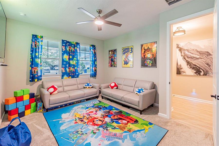 Furnished interior view inside a new home in Seasons at Lakeside Forest, Tavares (Image 31).