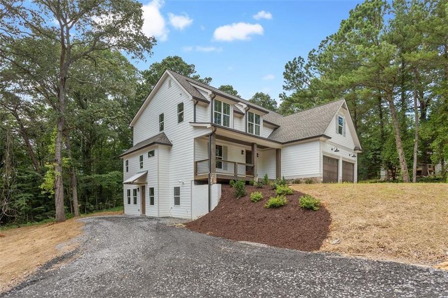 Front exterior of a new home in , Canton, GA, highlighting curb appeal (Image 29).