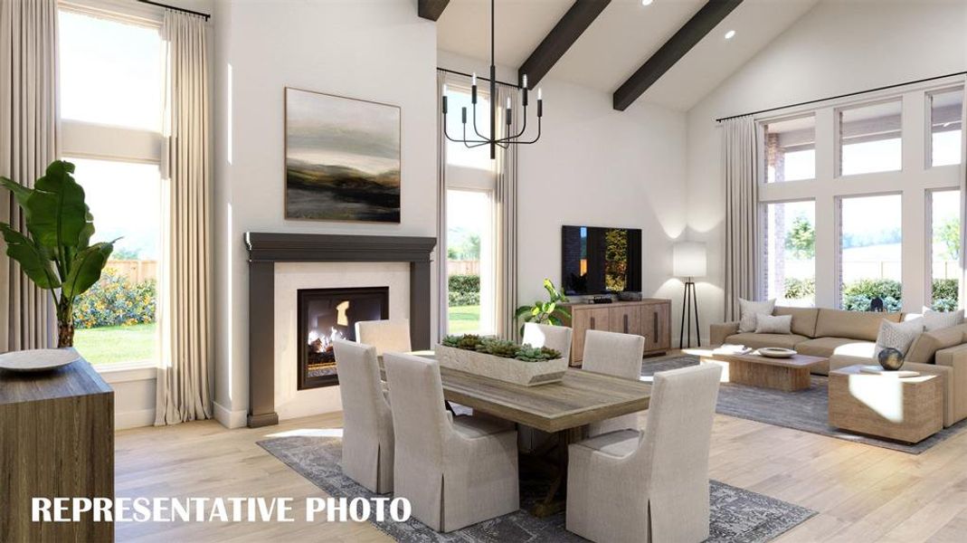 Featuring an elegant fireplace and beamed ceiling, memories will be made in this over the top home!  REPRESENTATIVE