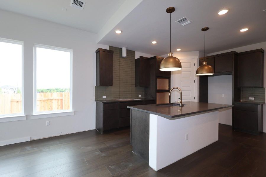 Furnished interior view inside a new home in Flora, Hutto (Image 9).