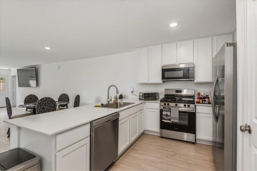 Furnished interior view inside a new home in Tavola, New Caney (Image 11).