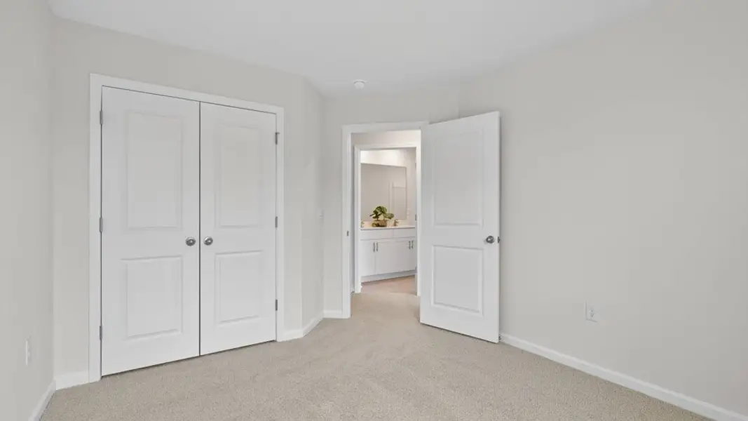 Spacious, unfurnished interior of a new home in The Townes at Anderson Farm, Wendell (Image 21).