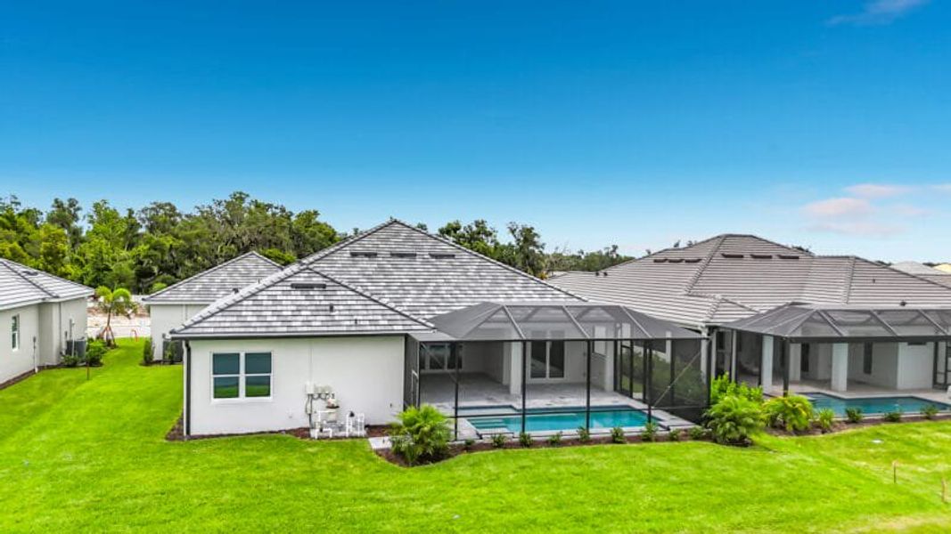 Exterior details and patio area of a home in River Preserve Estates, Parrish (Image 34).