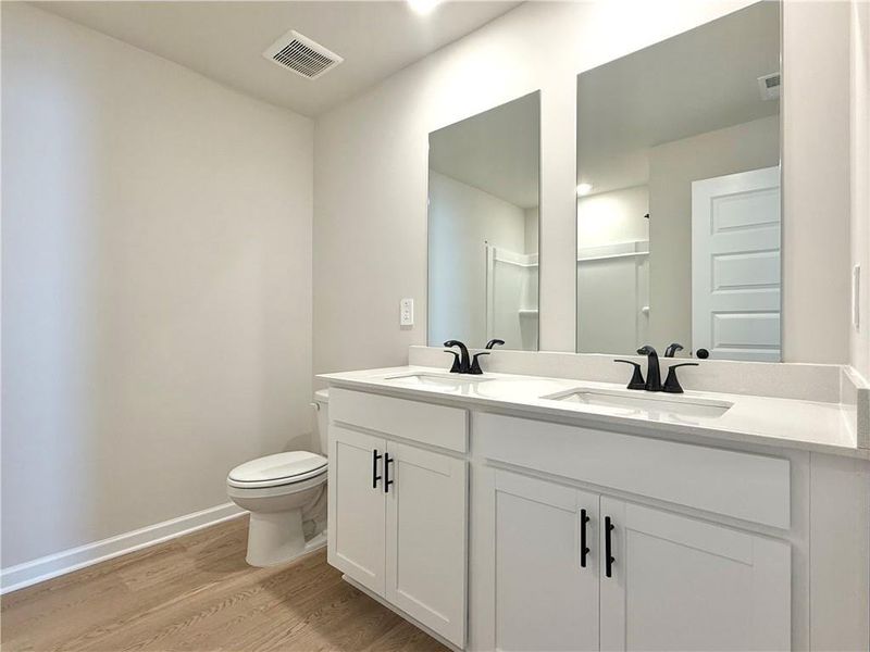 Furnished interior view inside a new home in Vines at Mill Creek - Estate Series, Braselton (Image 12).