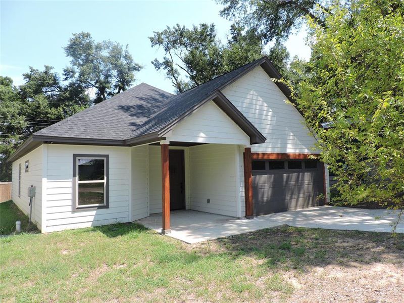 Front exterior of a new home in , Gun Barrel City, TX, highlighting curb appeal (Image 13). Front exterior of a new home in , Gun Barrel City, TX, highlighting curb appeal (Image 13).