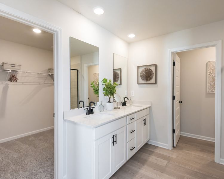 Furnished interior view inside a new home in Vines at Mill Creek - Estate Series, Braselton (Image 15).