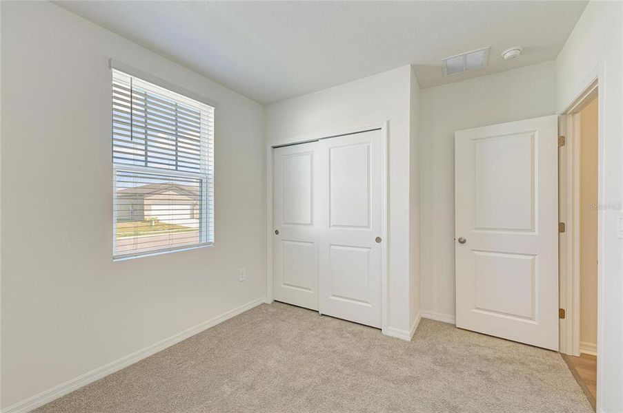 Spacious, unfurnished interior of a new home in Magnolia Bay - Classic Series, Nokomis (Image 34).