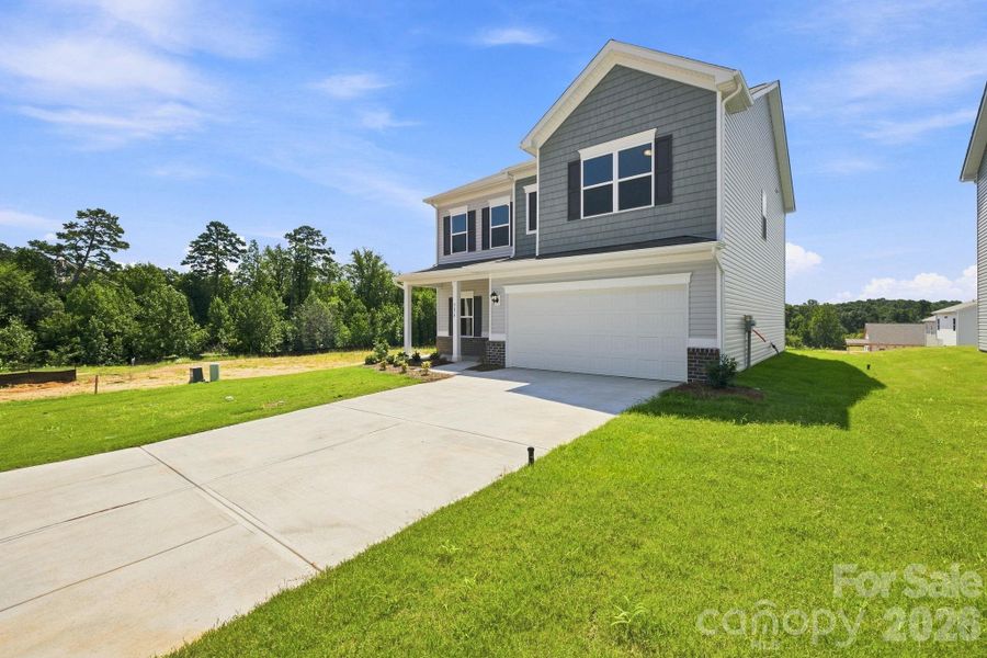 Front exterior of a new home in Catawba Trace, Catawba, NC, highlighting curb appeal (Image 22).