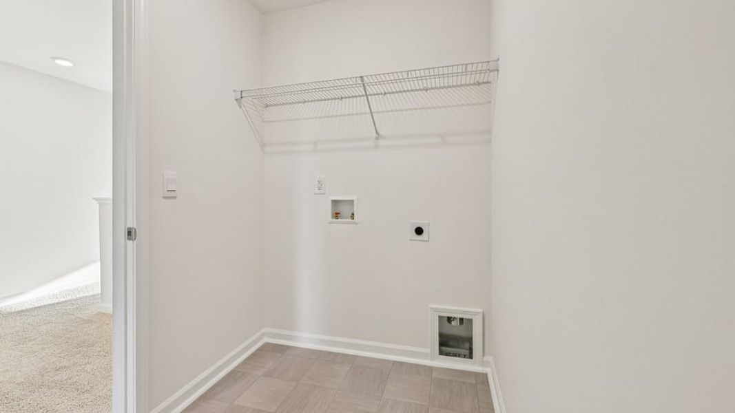 Spacious, unfurnished interior of a new home in Chapel Townes, Raleigh (Image 25).