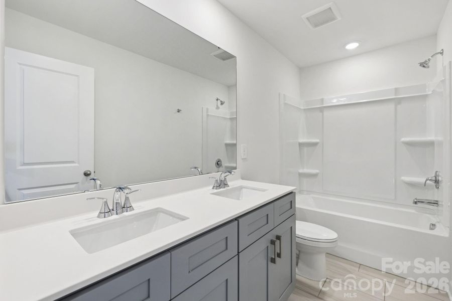 Photo is not of the actual home, but is an inspirational photo of builder’s model home and may depict options, furnishings, and/or decorator features that are not included