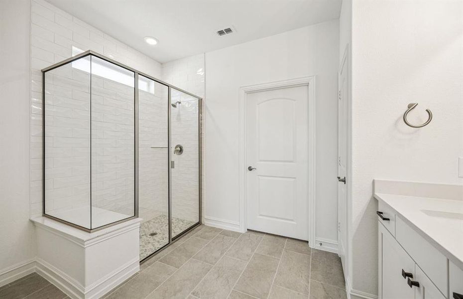 Deep walk in shower in owner's suite *Real home pictured Deep walk in shower in owner's suite *Real home pictured