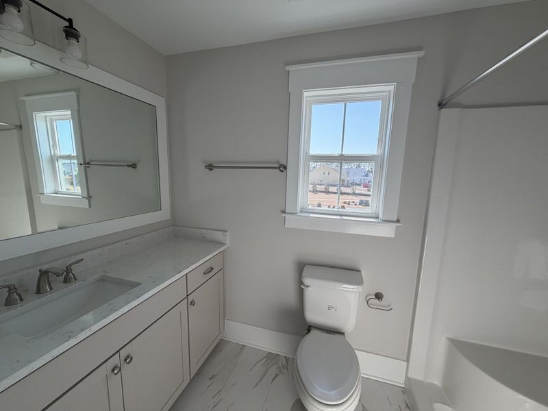 Furnished interior view inside a new home in The Sanctuary at Sunset Beach, Sunset Beach (Image 11).