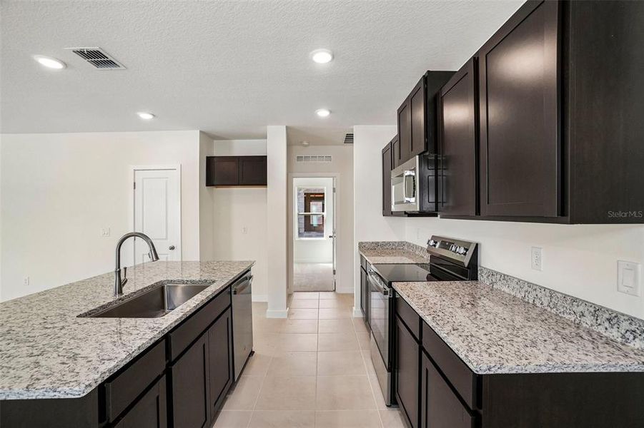 Furnished interior view inside a new home in Willowbrook North, Winter Haven (Image 11). Furnished interior view inside a new home in Willowbrook North, Winter Haven (Image 11).