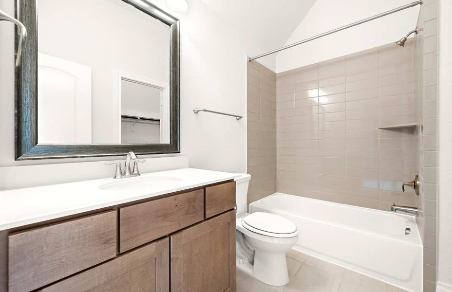 Representative furnished interior of a home built from the 4094 by Ravenna Homes in Artavia 70′, Conroe (Image 35).