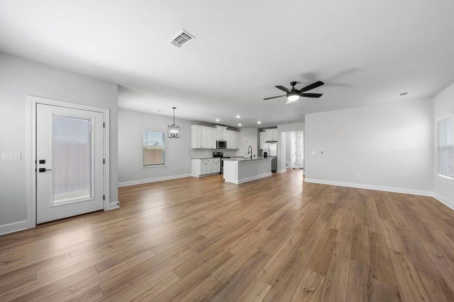 Whether you're watching a movie, sharing stories, or just unwinding at the end of the day, the family room is designed for relaxation and making memories.