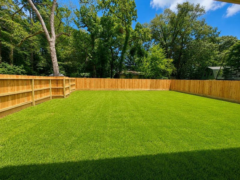 Privacy fenced in backyard *Virtually enhanced image Privacy fenced in backyard *Virtually enhanced image