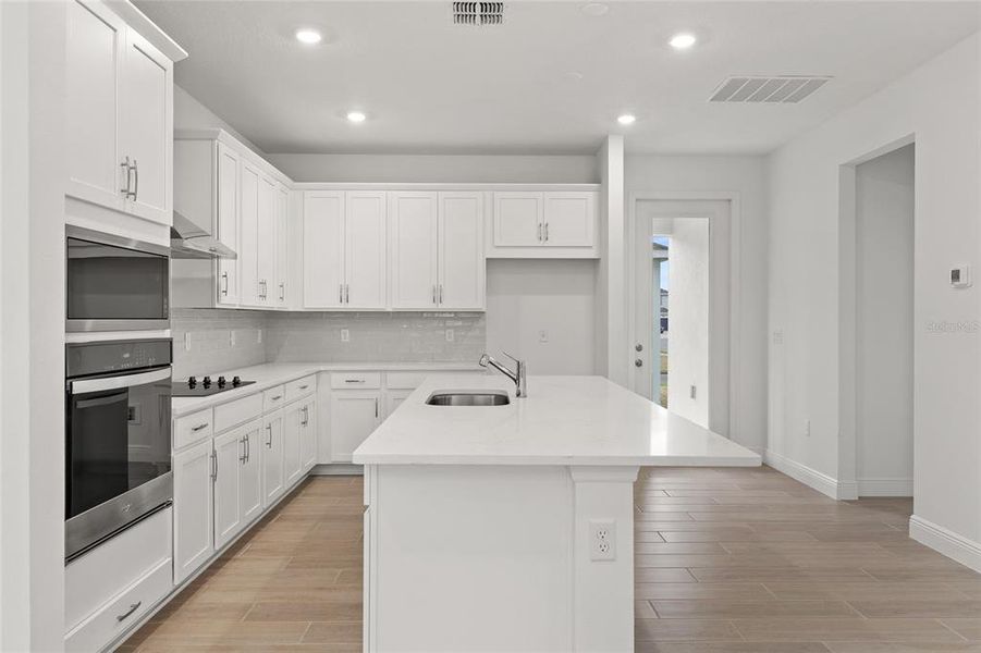 Furnished interior view inside a new home in Crossroads at Kelly Park, Apopka (Image 10).