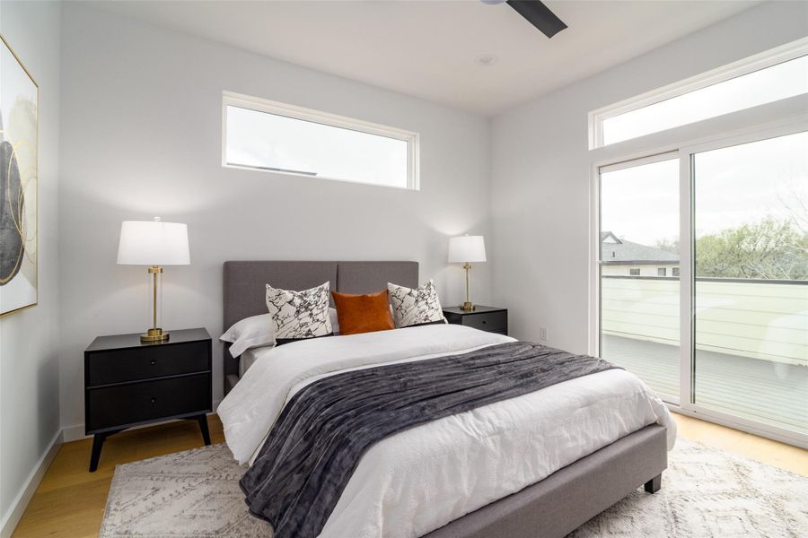 Primary Bedroom with access to balcony