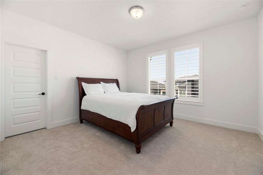 Furnished interior view inside a new home in Bridgeland, Cypress (Image 12).