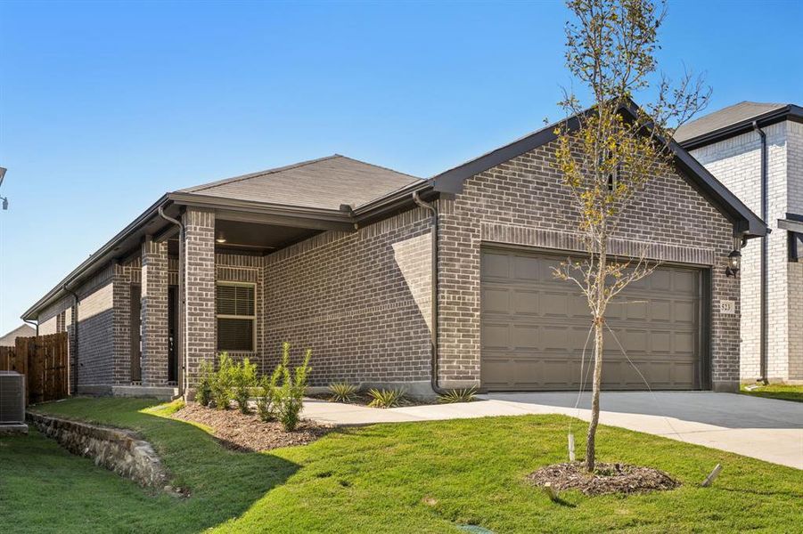 Front exterior of a new home in Simpson Crossing - Spring Series, McKinney, TX, highlighting curb appeal (Image 22). Front exterior of a new home in Simpson Crossing - Spring Series, McKinney, TX, highlighting curb appeal (Image 22).