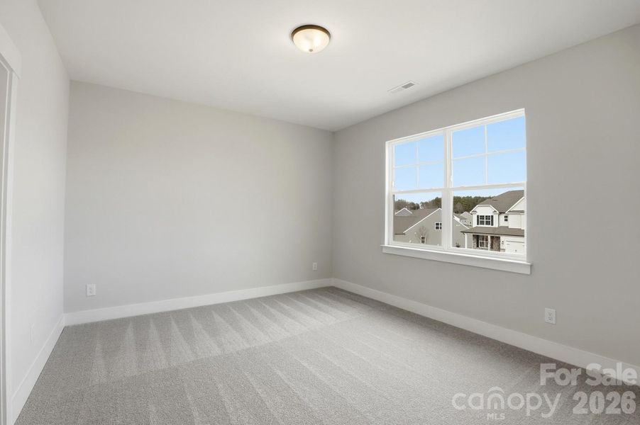 Spacious, unfurnished interior of a new home in Carrington, Stanley (Image 17).