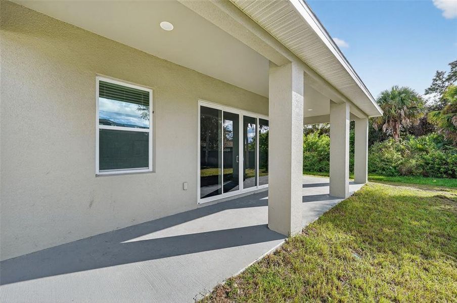 Exterior details and patio area of a home in , North Port (Image 3).