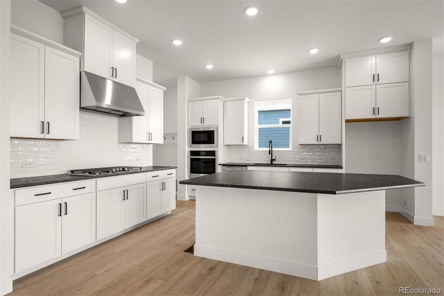 Furnished interior view inside a new home in Wolf Ranch - Enclave Collection, Colorado Springs (Image 3).