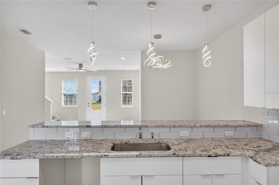 Furnished interior view inside a new home in , Davenport (Image 9).