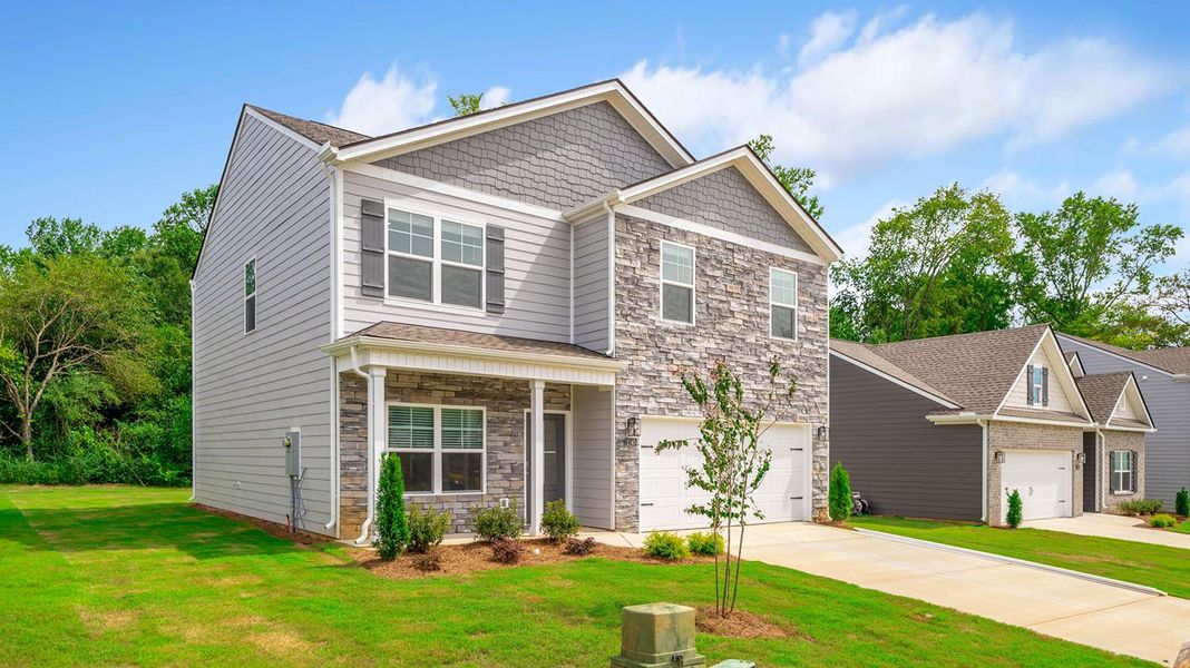 Front exterior of a new home in Fairview Hills, Cleveland, TN, highlighting curb appeal (Image 2).