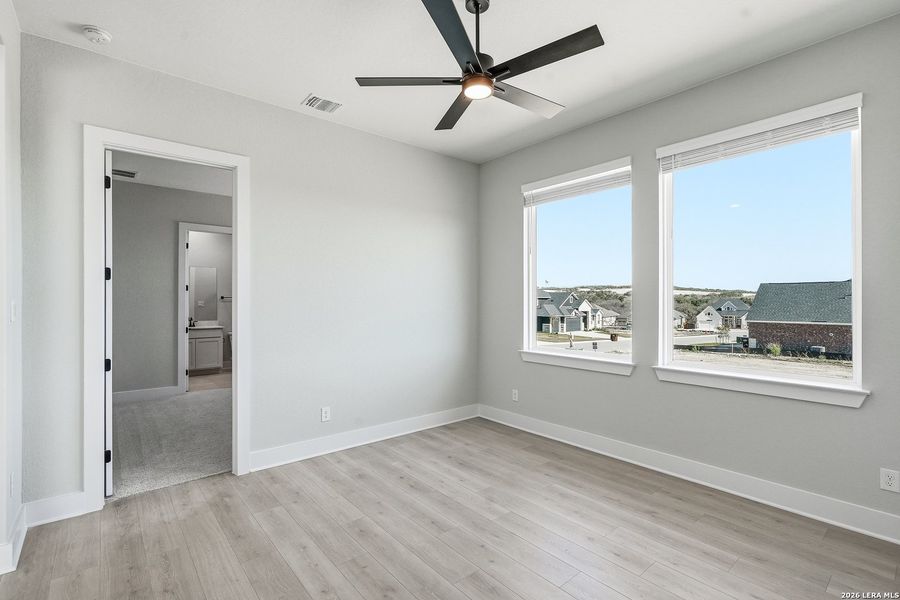 Spacious, unfurnished interior of a new home in Potranco Oaks, Castroville (Image 25).