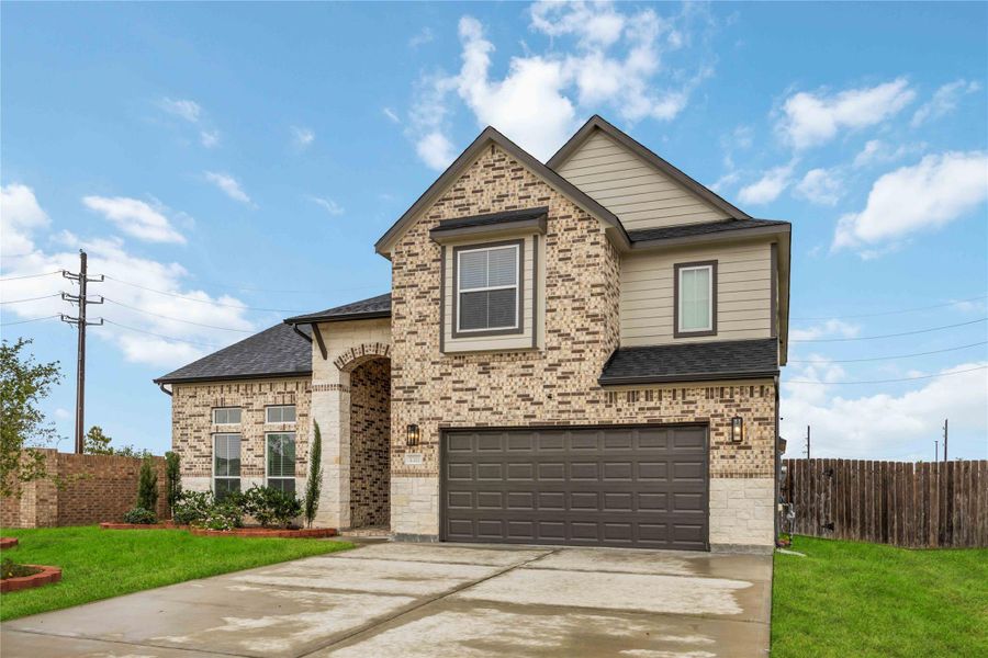 Front exterior of a new home in Briarwood Crossing, Rosenberg, TX, highlighting curb appeal (Image 25).
