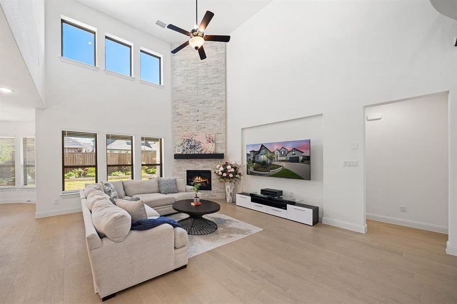 Spacious living room with abundant windows.