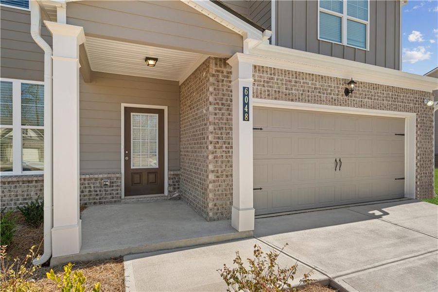 Exterior details and patio area of a home in Highland Park, Stonecrest (Image 3).
