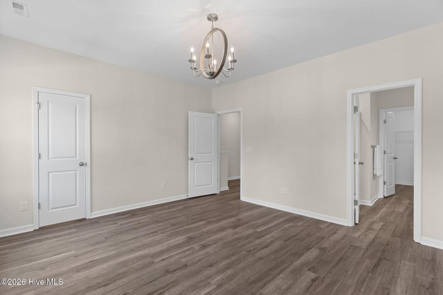 Spacious, unfurnished interior of a new home in Coastal Haven Townes, Leland (Image 25).