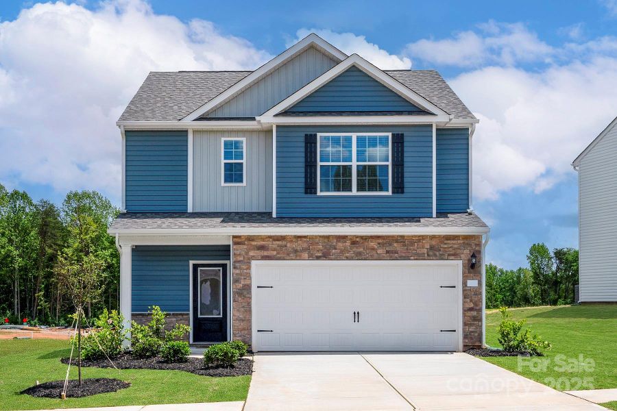 Front exterior of a new home in Ascot Woods, Charlotte, NC, highlighting curb appeal (Image 1).