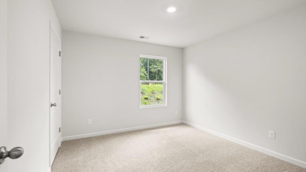 Spacious, unfurnished interior of a new home in Northwoods at Mirror Lake, Villa Rica (Image 11).
