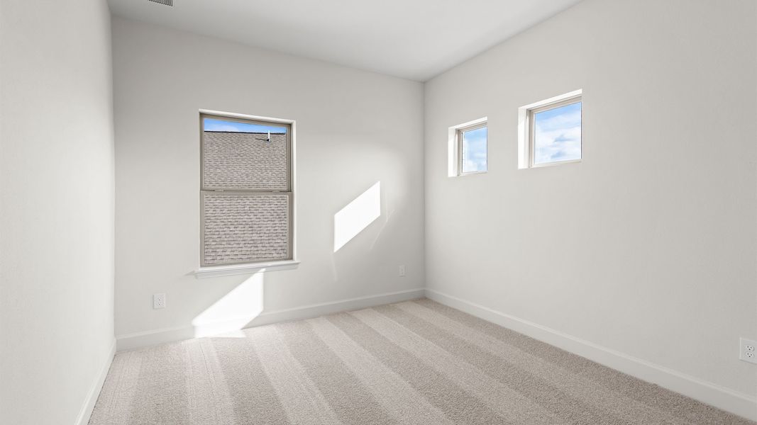 Spacious, unfurnished interior of a new home in Bridgeland, Cypress (Image 34).